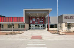 Flush Metal Wall Panels In Three Shades Of Red In A Seemingly Random Pattern Add A Playful Feel To The Alma Brewer Strawn Elementary School In Lytton Springs, Texas Photo: Buenavistaphotography