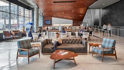 People Working In A Variety Of Spaces Inside Ncr's Office In Atlanta