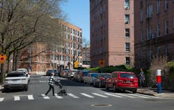 Thwaites Place street view with woman walking