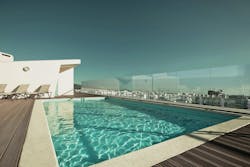 Ocula frameless windscreen beside pool