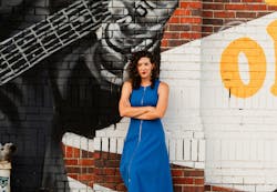 Anna Cawrse against mural Anna Cawrse against mural