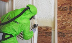 Man using spray foam insulation brand Enverge Man using spray foam insulation brand Enverge