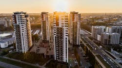 High Angle Photography of High-rise Buildings Near Road during Golden Hour