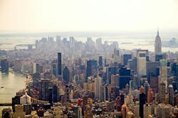 An aerial view of the Manhattan skyline and the Empire State Building in New York City. An aerial view of the Manhattan skyline and the Empire State Building in New York City.