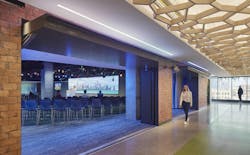 Confidential Technology Client Headquarters, Chicago, Ill. The north garage doors open fully to connect the 300-person event room with the Boulevard pre-function space, offering an unobstructed view of the city to the west