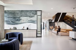 Stonebriar Commercial Finance, Plano, Texas. The adjacency of the collaboration and amenity areas is key to Stonebriar Commercial Finance&rsquo;s fluidity