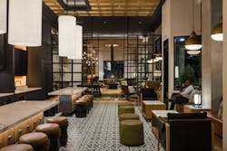 Pictured: The Midland Lofts, Kansas City, Mo. To supplement the apartments&rsquo; compact floorplans, Midland Lofts offers community amenities such as a library, co-working space, and coffee bar