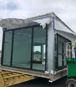 Module being prepared and loaded on truck bed for shipping to the site Module being prepared and loaded on truck bed for shipping to the site