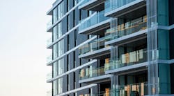 Outside view of modern apartments with glass terraces Outside view of modern apartments with glass terraces