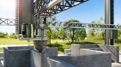 3d printing single-family house with concrete. New technology house building using a modern CNC machine