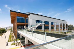 A second-floor bridge connects the new facility to the existing campus. Photo &copy; LPA