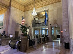 To redevelop Oklahoma City's historic First National Center into a residential and hospitality hub, Walter P Moore engineered a new mat foundation within the original sub-basement, creating a parking structure with upgraded support in the dense urban landmark. Photo &copy; Walter P Moore