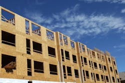 Large Apartment Complex under Construction. New construction of a large apartment complex Large Apartment Complex under Construction. New construction of a large apartment complex