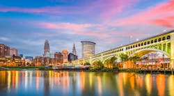 Cleveland, Ohio, USA downtown city skyline on the Cuyahoga River at twilight.