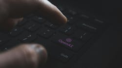 OpenAI logo on PC keyboard. ChatGPT is an AI chatbot launched by OpenAI