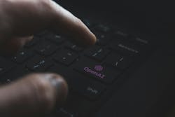 OpenAI logo on PC keyboard. ChatGPT is an AI chatbot launched by OpenAI