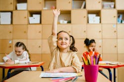 Girl Raising Hand Inside the Classroom Girl Raising Hand Inside the Classroom